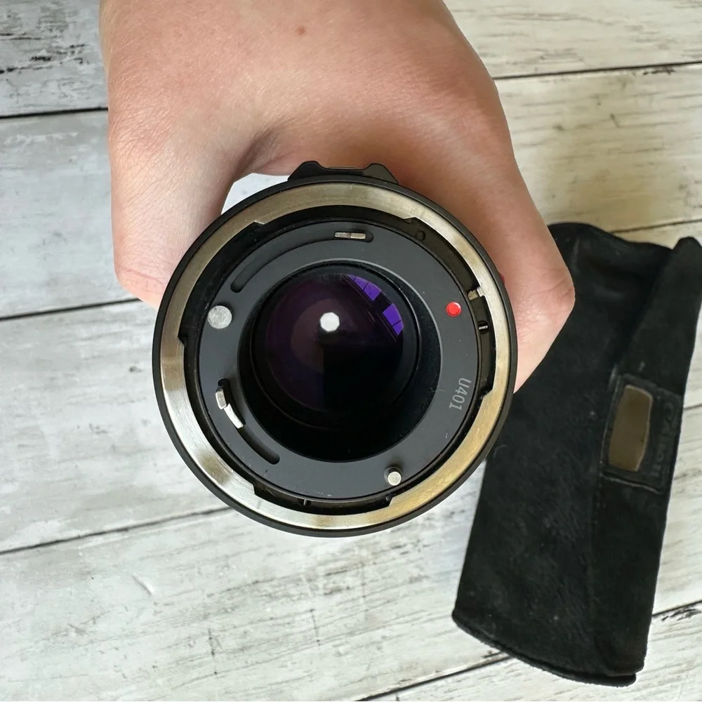 VINTAGE PREOWNED CANON LENS FD 200 MM 1:4 BLACK LENS WITH CAP AND CASE